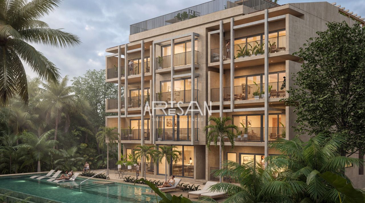 Artesan building and ground-floor pool at dusk