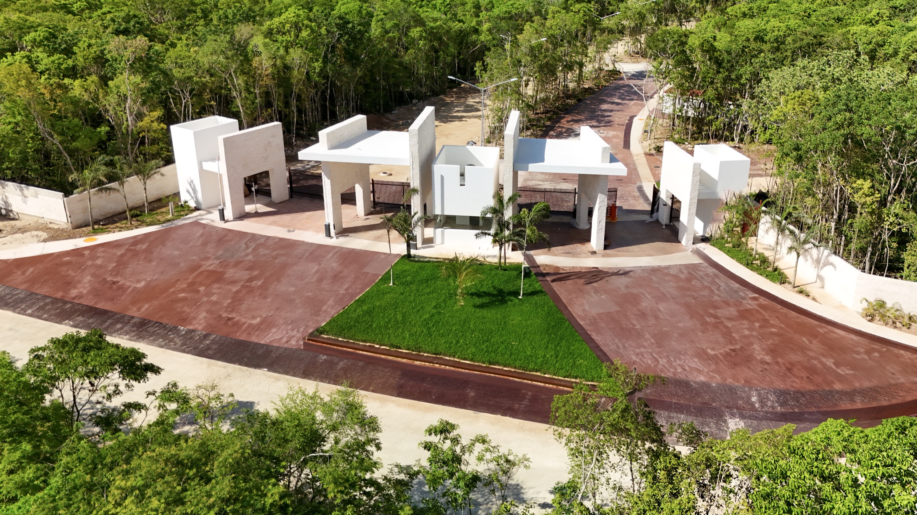 Photograph of the lap pool and gym building at the Senderos club house, Ciudad Mayakoba