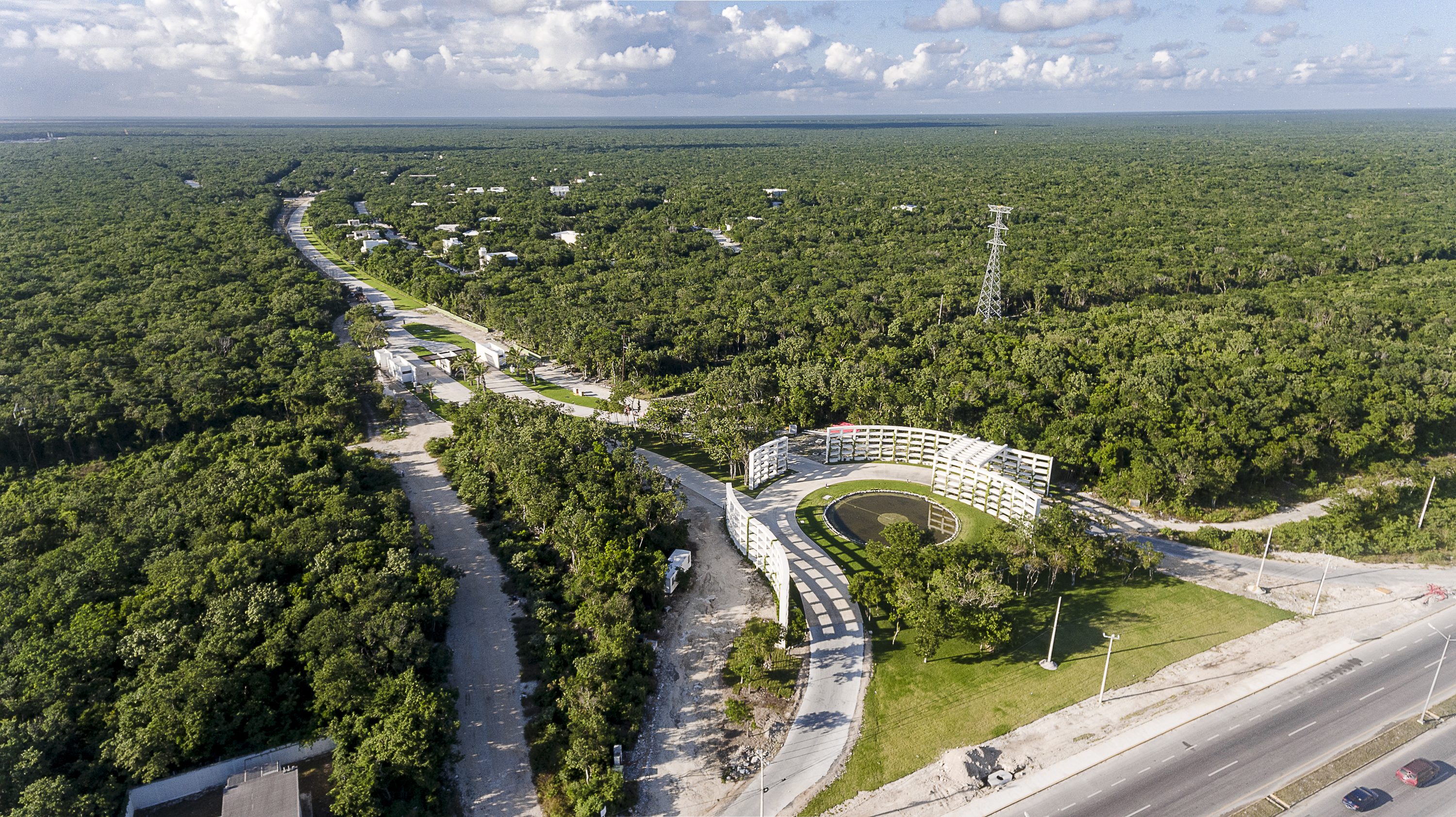 Aerial photograph of internal roads and tree canopy at Xpuha Beach Residential Resort