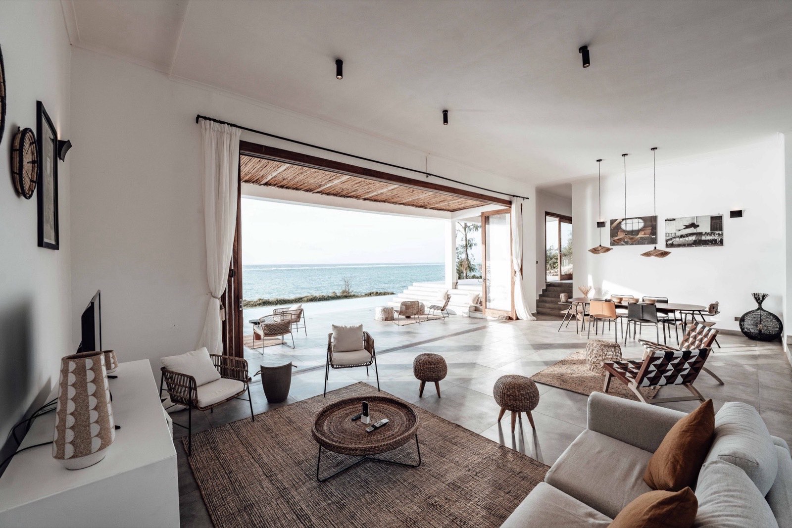 Open palapa living room to the sea, full-width sliding doors